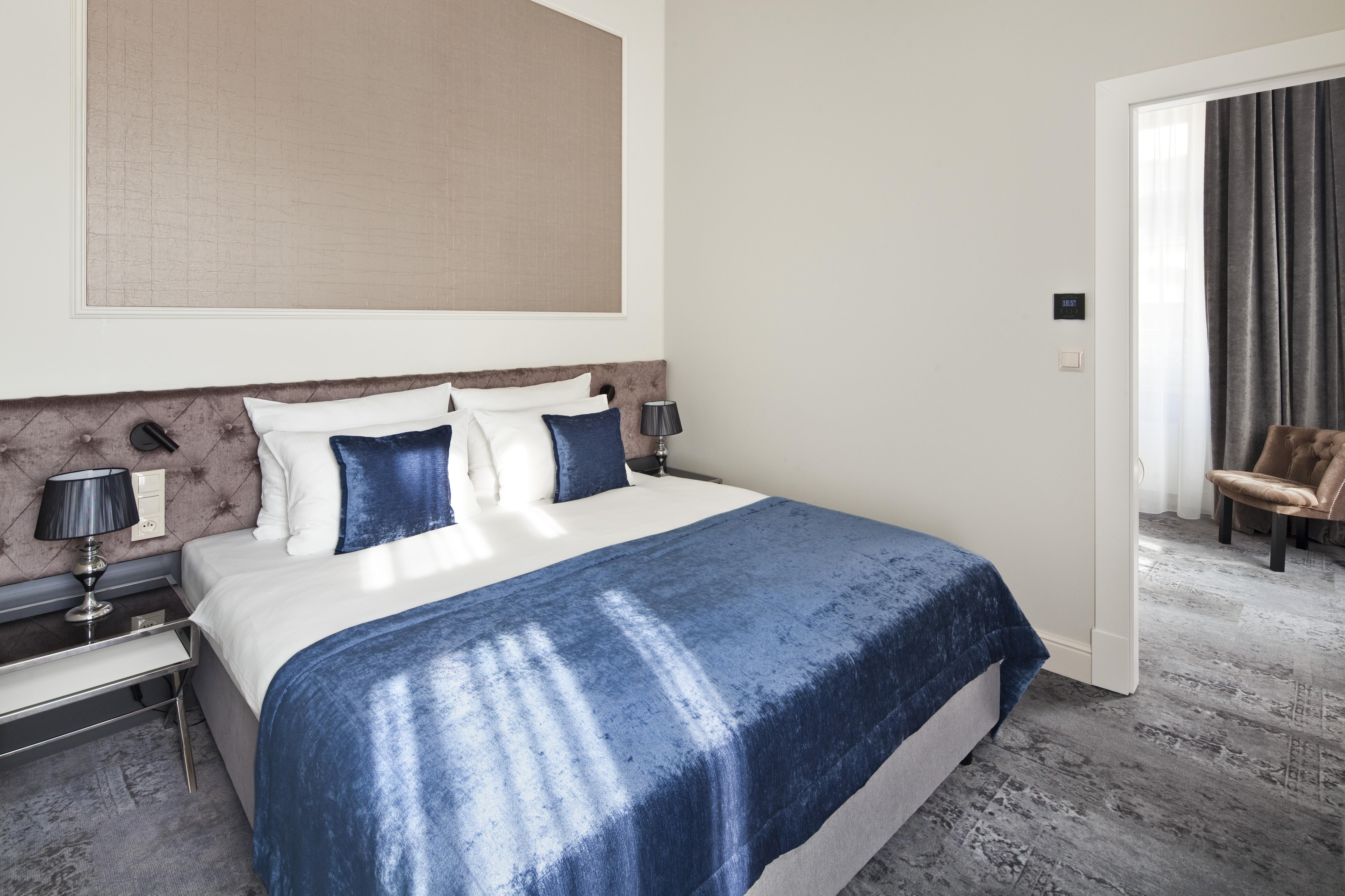 Wyndham Grand Krakow Old Town Hotel Exterior photo A bedroom at the hotel
