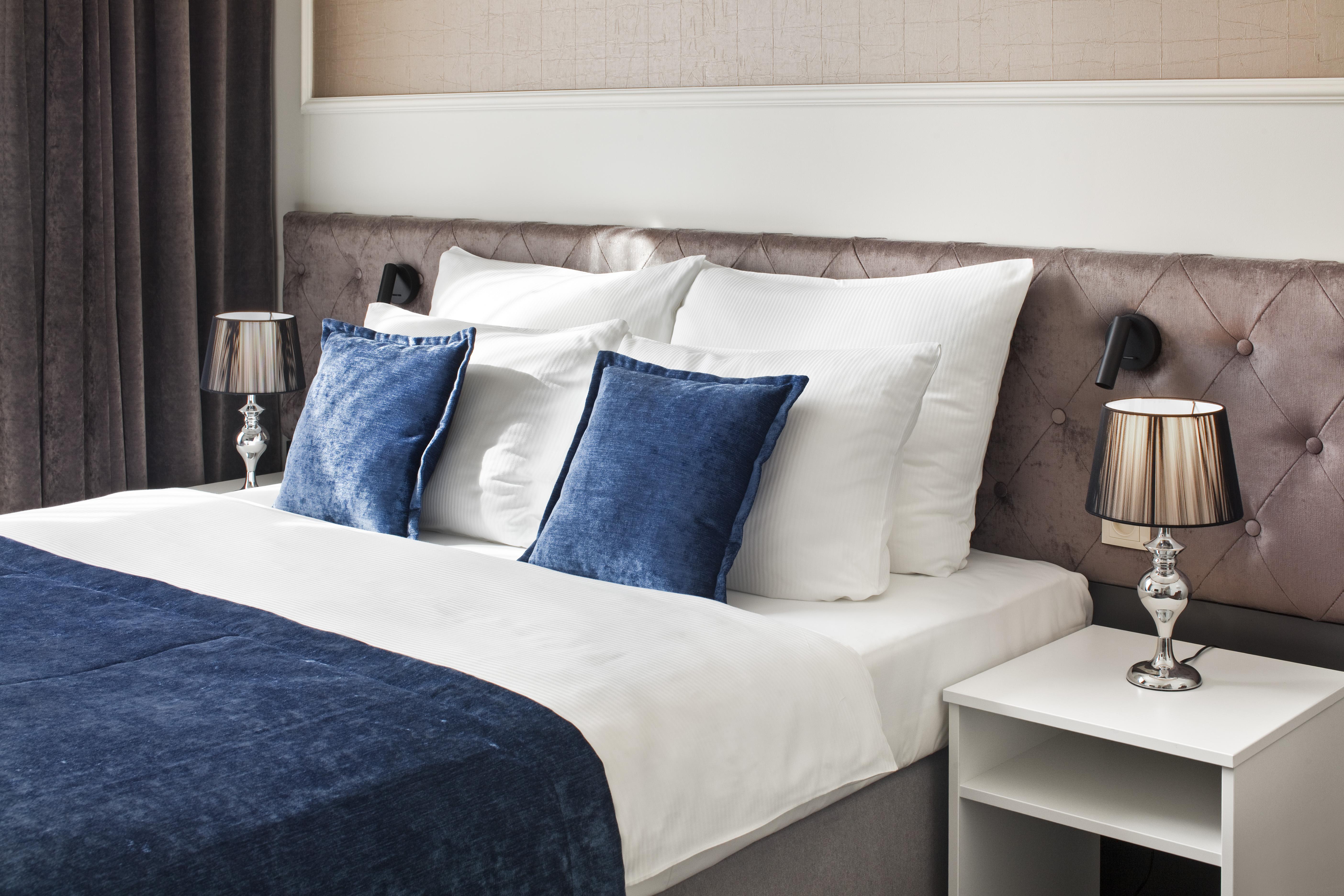 Wyndham Grand Krakow Old Town Hotel Exterior photo A bed with a bed frame