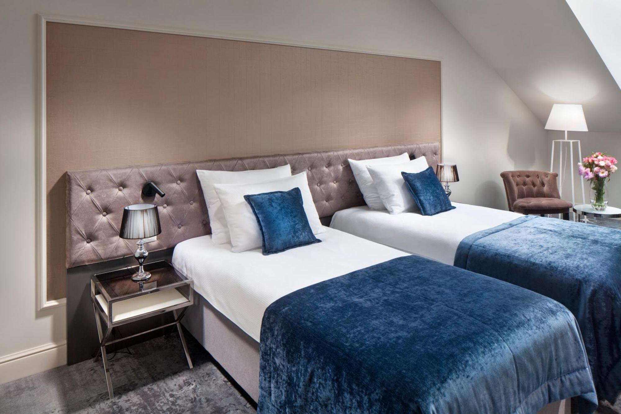 Wyndham Grand Krakow Old Town Hotel Exterior photo A bedroom at the hotel